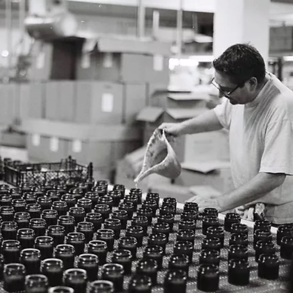 hand-poured candles in factory